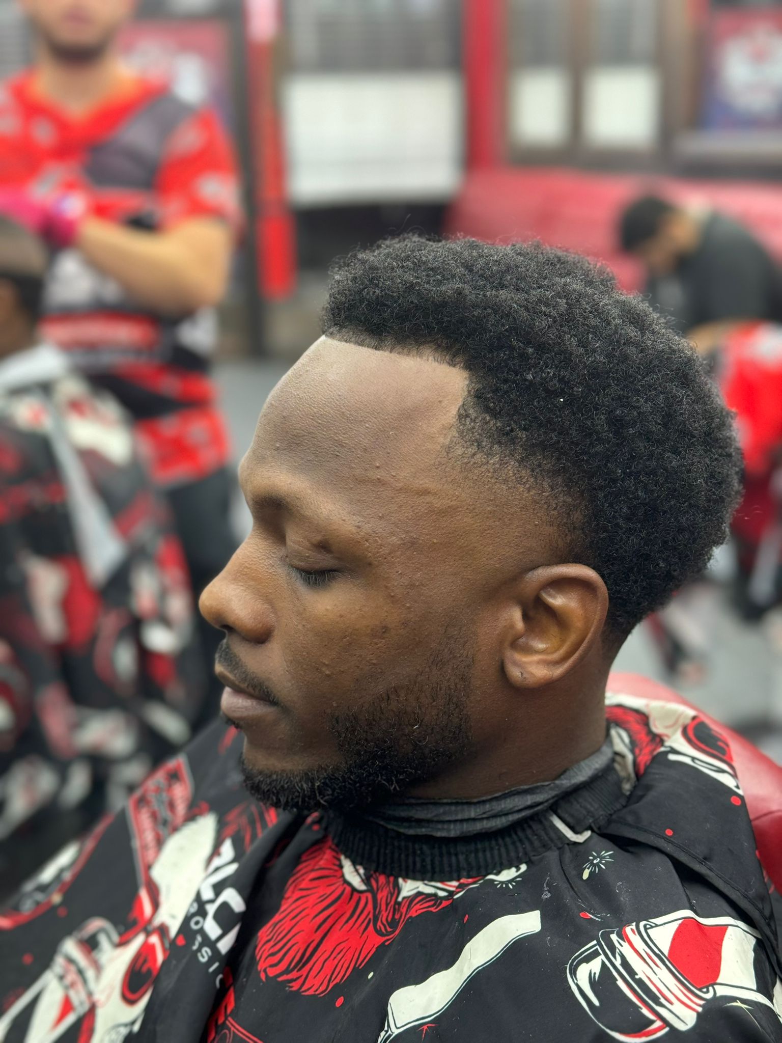 Curly afro fade with beard